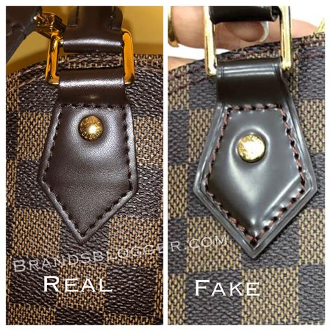 borsello lv uomo falso|How to Spot a Fake Louis Vuitton Alma Bag.